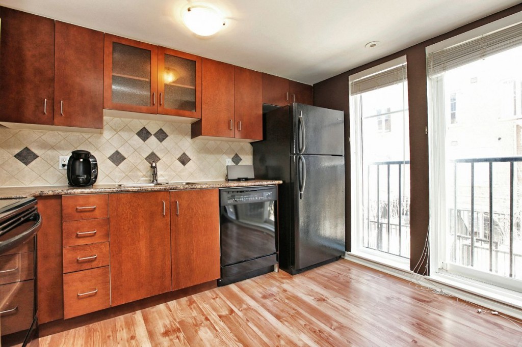 34 Western Battery Rd 408 kitchen with windows to pathway